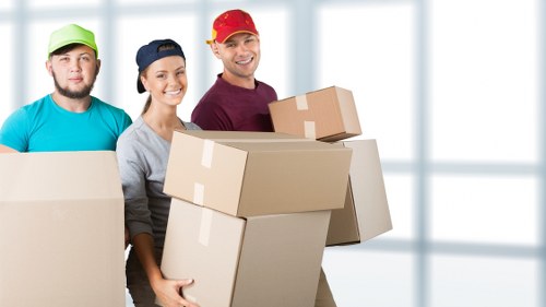 Packing and wrapping belongings for a home move in Swiss Cottage