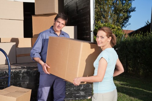 Packed household items prepared for transport in a Swiss Cottage relocation