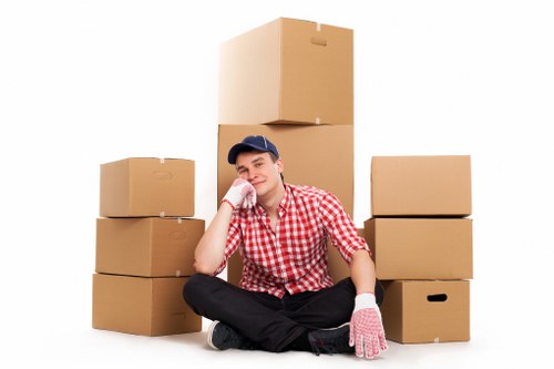 Packaged workplace items ready for loading during a local business move