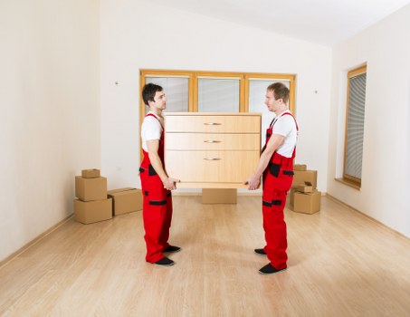 Professional movers handling commercial relocation items in Swiss Cottage