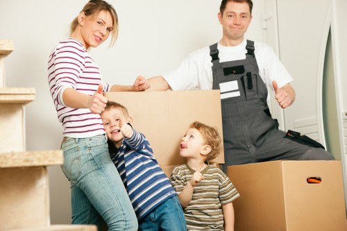 Packed household items ready for transport with a moving van service
